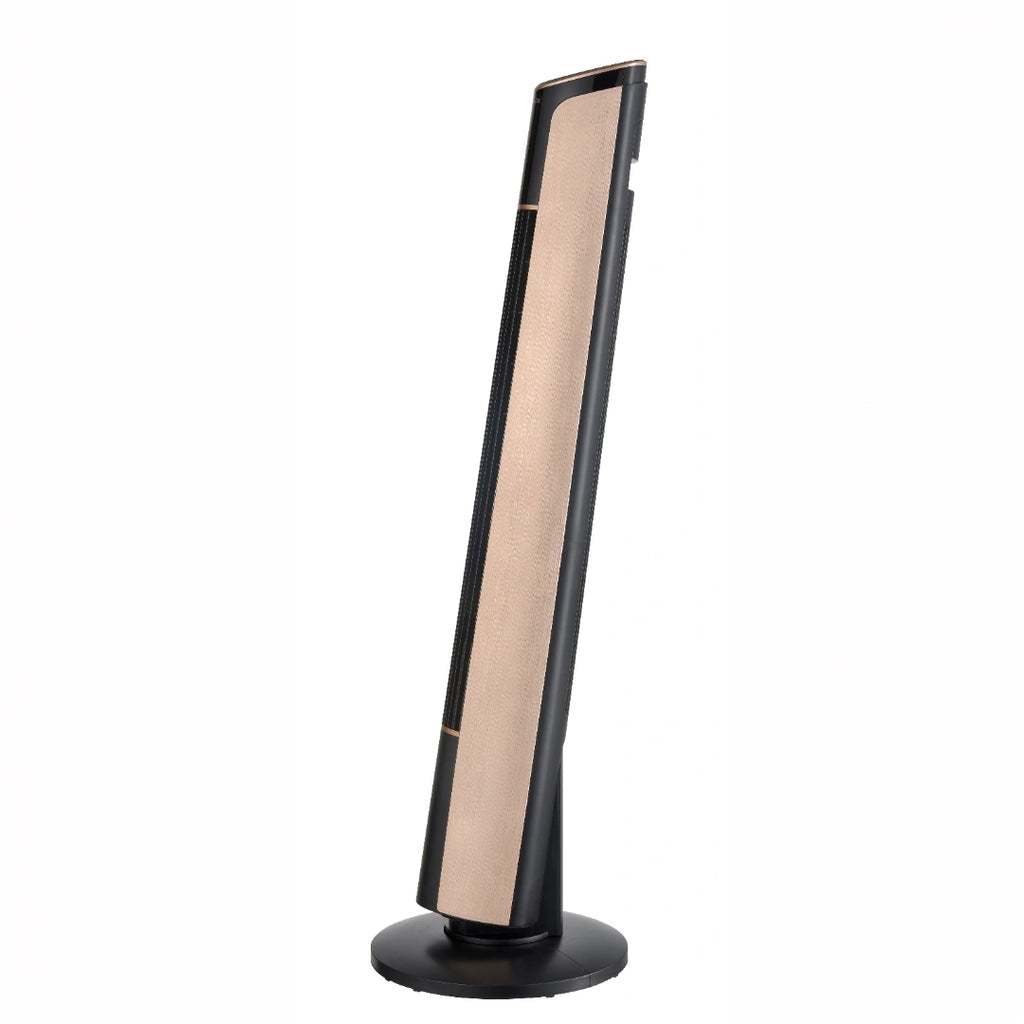 A tall, slender black and copper Dimplex Ion Fresh tower fan standing elegantly on a hardwood floor next to a modern armchair.