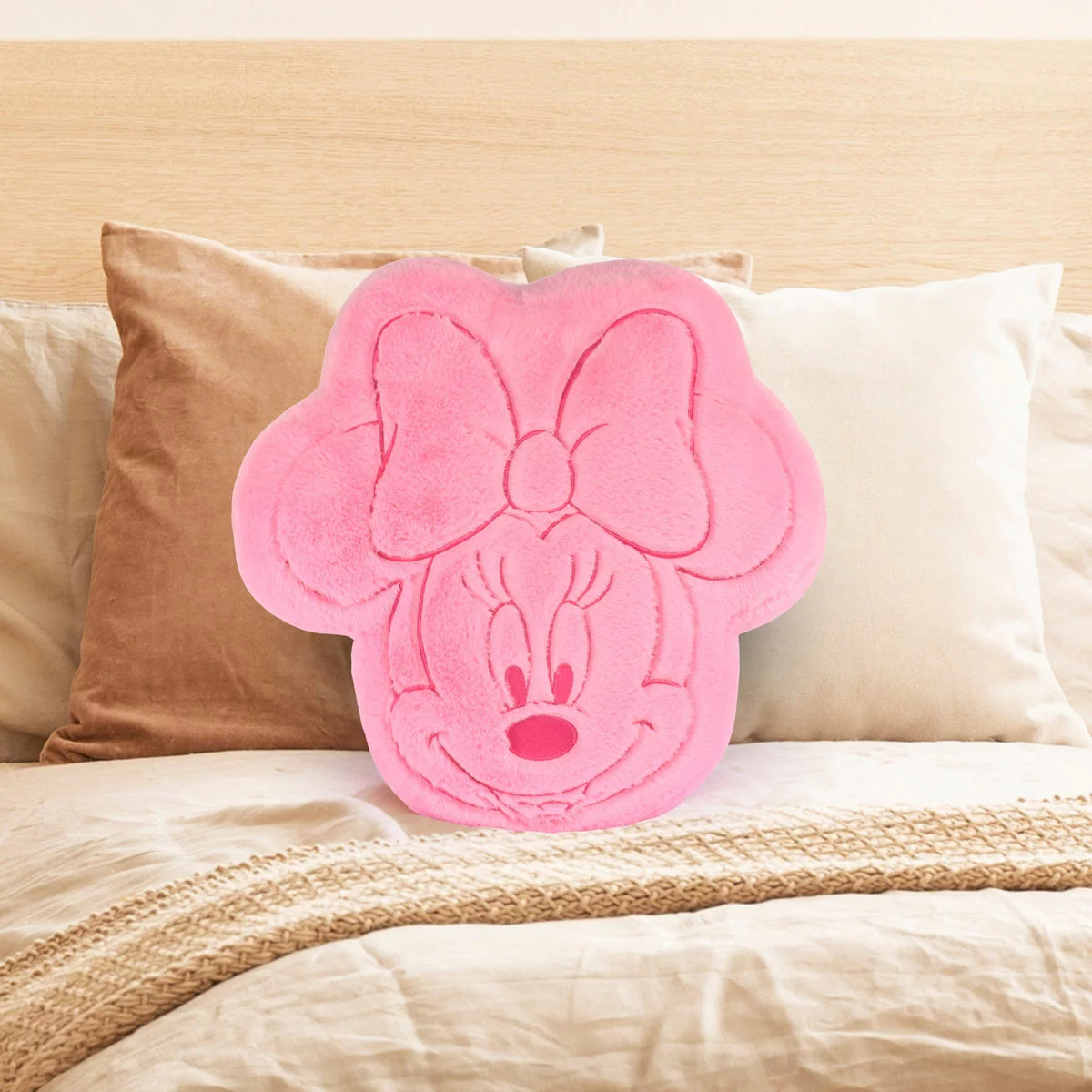 Soft Stitch character shaped oversized cushion crafted from plush faux rabbit fur resting on a cozy child's bed.