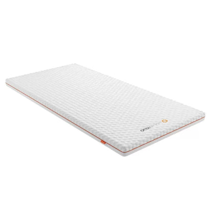 Top angle of open-cell Dormeo Octasmart Plus Mattress Topper showing breathable white cover fabric and inner honeycombed spring structure on a modern bed setup.
