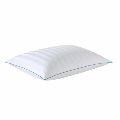 Crisp white Down Haven king size duck down pillow featuring a subtle striped 500 thread count cotton cover resting on a neatly dressed king bed.