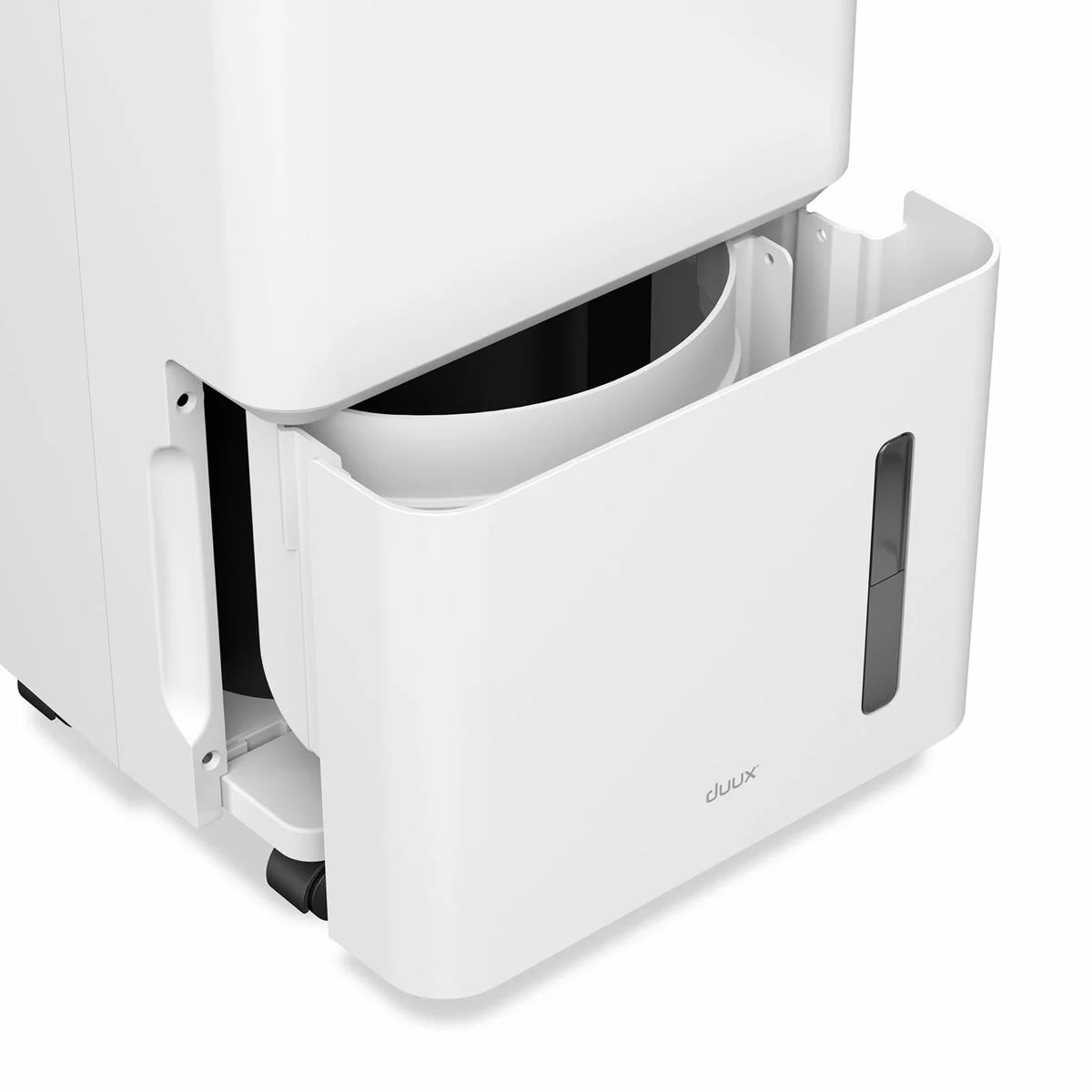 Front view of the white Duux Bora 12L dehumidifier standing on a modern wooden floor next to a laundry airer, highlighting its sleek digital display panel.