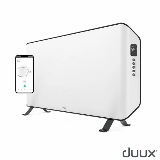 Front view of the ultra-slim matte white Duux Edge 1000W Smart Convector Heater mounted on a modern grey wall in a contemporary living room.