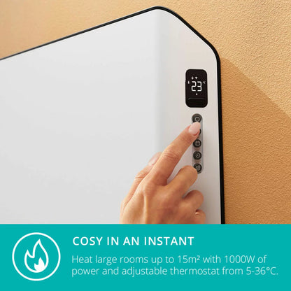 Front view of the ultra-slim matte white Duux Edge 1000W Smart Convector Heater mounted on a modern grey wall in a contemporary living room.
