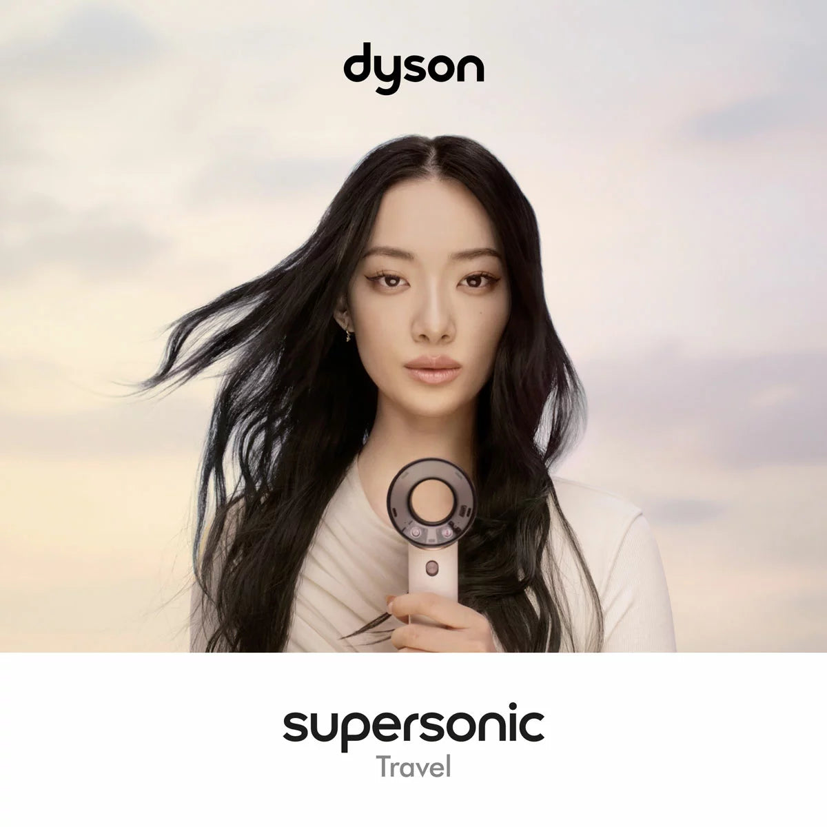 Dyson Supersonic travel hair dryer in limited edition ceramic pink finish alongside its matching precision styling magnetic attachments.
