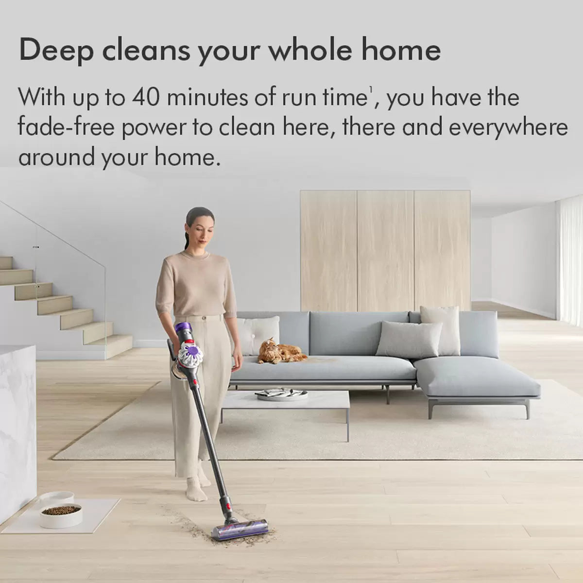 Dyson V8 Advanced Stick Vacuum Cleaner cleaning carpets and hard floors in a modern family home