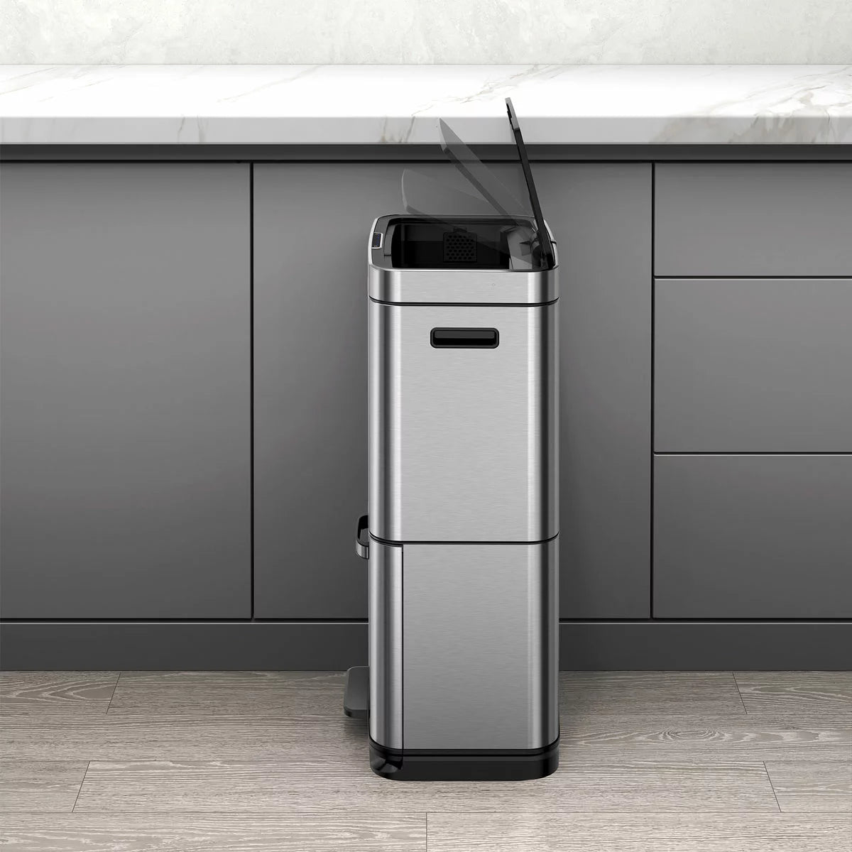 EKO 54L stainless steel motion sensor recycling bin with dual compartments in a contemporary kitchen.
