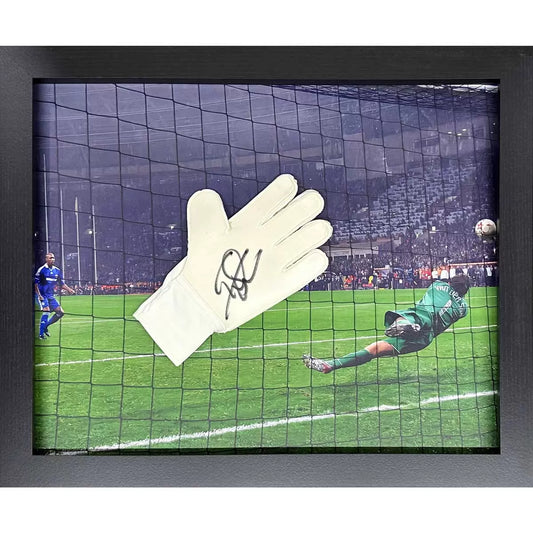 A close-up view of an authentic Adidas goalkeeper glove signed by Edwin van der Sar, displayed against a clean, neutral background to highlight the signature detail.