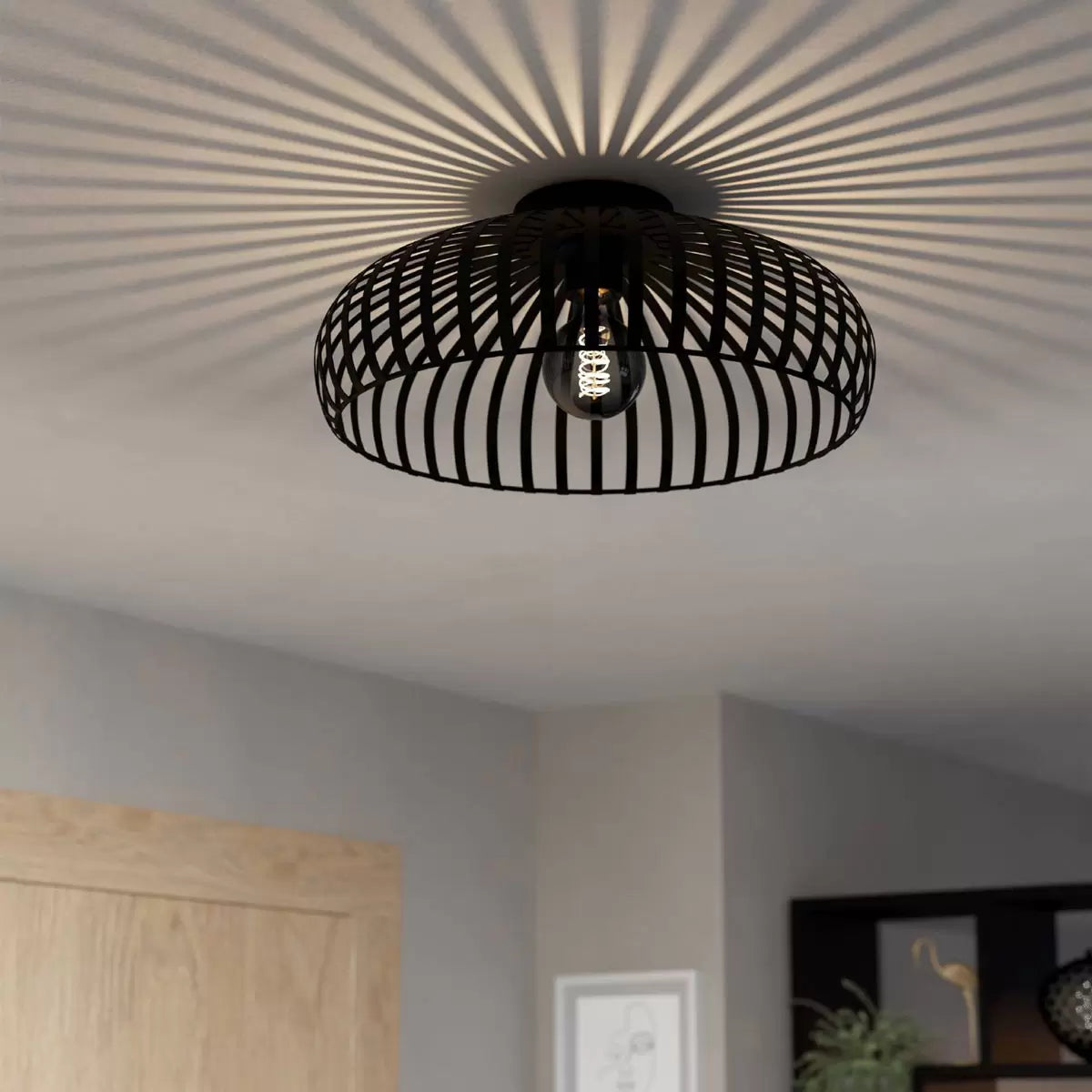 Eglo Mogano 17-inch black ceiling light providing modern ambient lighting for living rooms and contemporary interiors