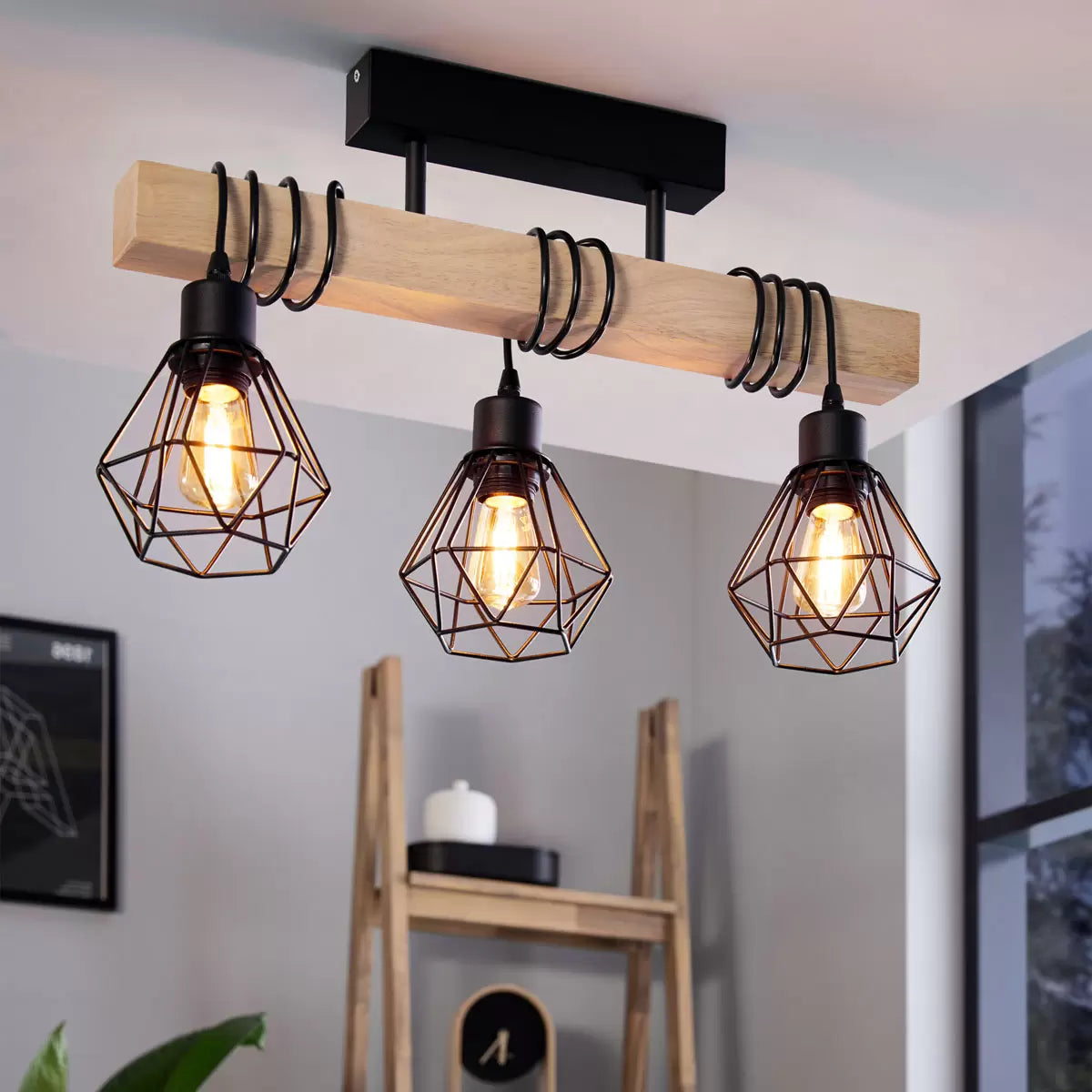 Eglo Townshend 3 Light Geometric Pendant with black metal geometric frame and natural wood beam detail for modern industrial interiors