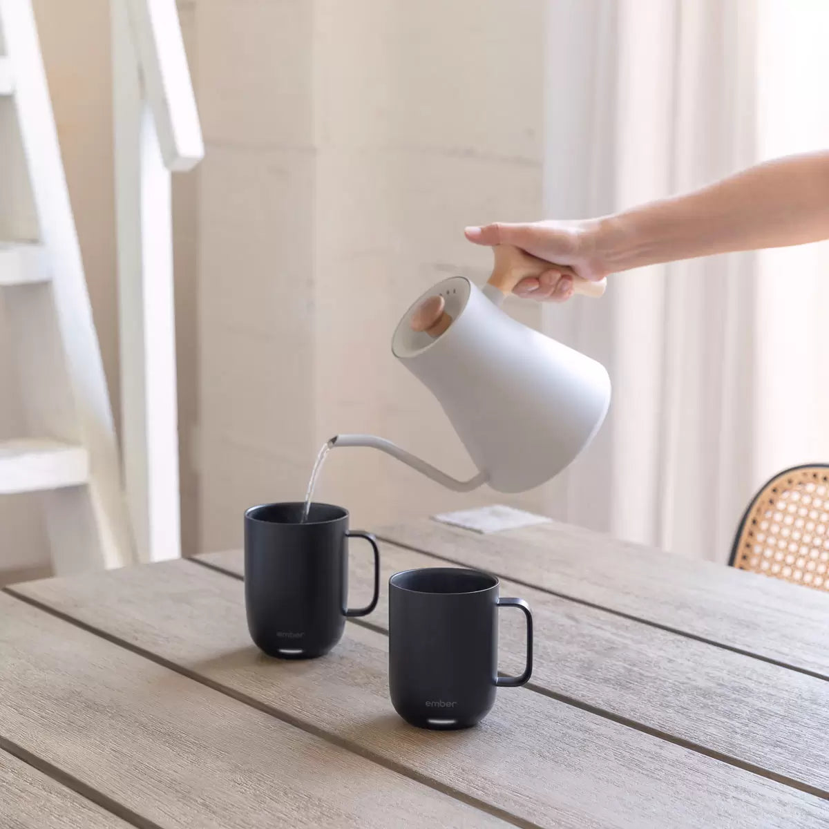 Ember Mug² 14oz black temperature control ceramic mug keeping coffee and tea at the perfect temperature.