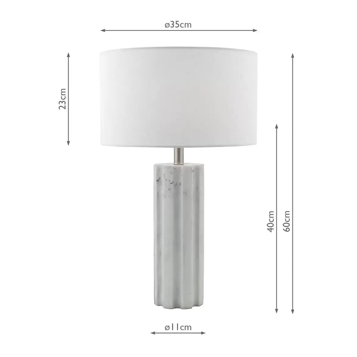 Front view of the Erebus table lamp showcasing its cylinder-shaped matte white marble effect resin base, polished chrome metal collar, and white linen drum shade on a glass desk.