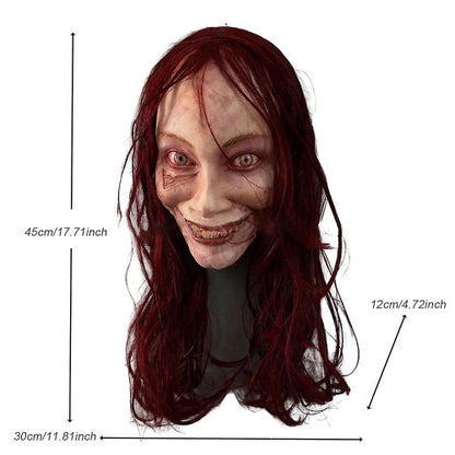 Front view of the Evil Dead Rise female ghost latex full face horror mask featuring a scary wide grin and pale possessed skin texture.