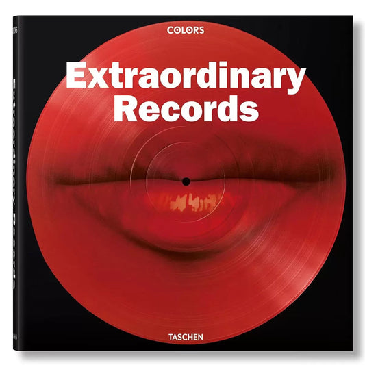 Extraordinary Records Book by Taschen with a bold dark cover and glossy vinyl-inspired artwork, photographed at a three-quarter angle on a modern music collector's shelf.


