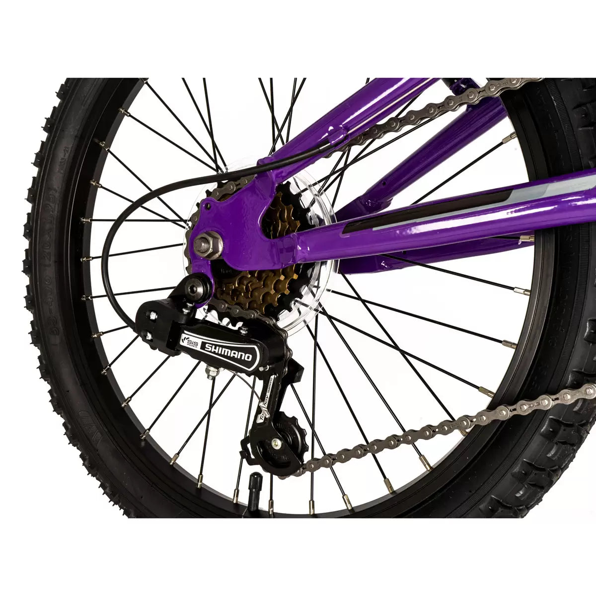 A vibrant purple Falcon Moonstone junior dual-suspension mountain bike with 20-inch knobbly black tyres, a rear spring shock absorber, and prominent white decals, parked on a gravel trail.
