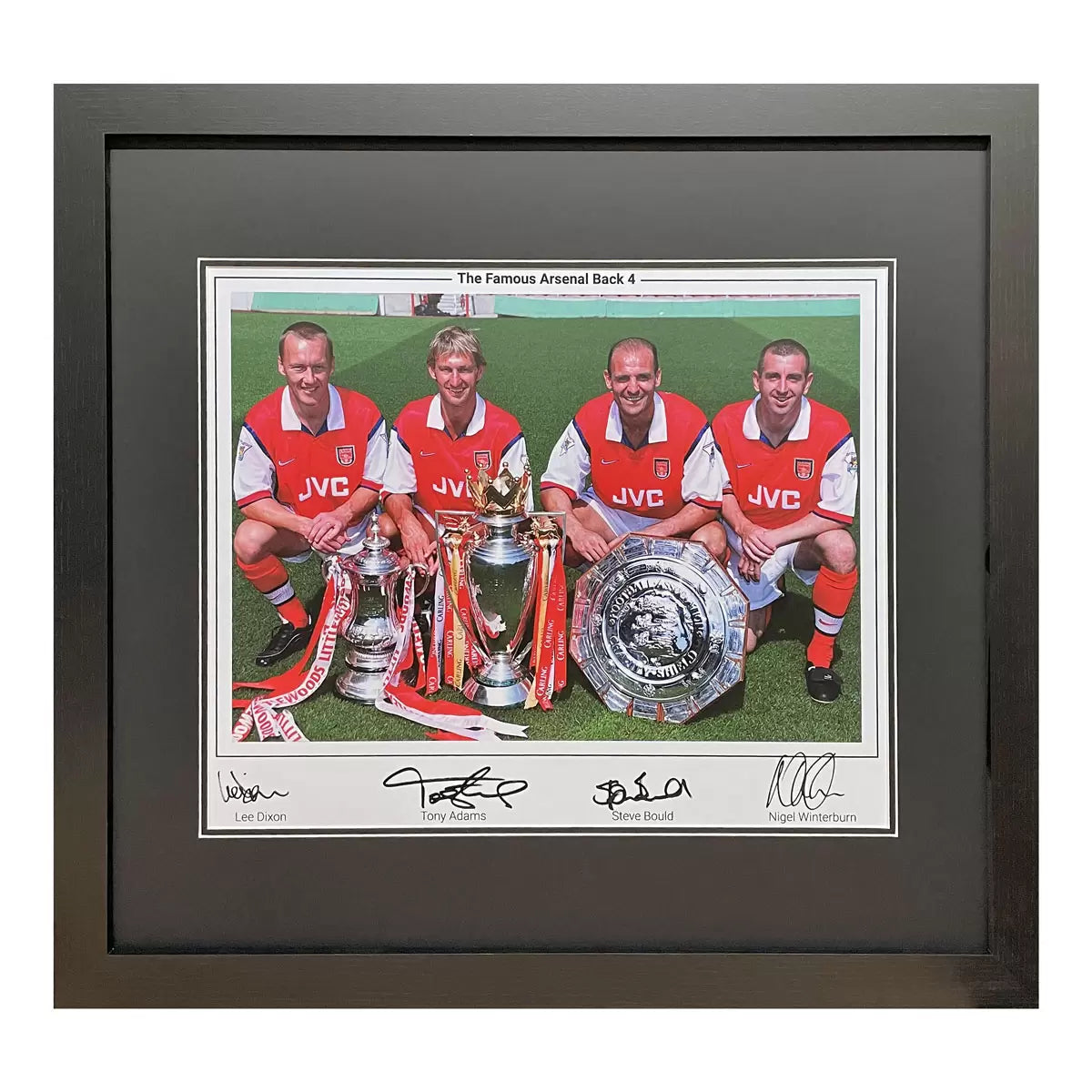A professionally framed, high-clarity black and white action shot of the Arsenal Back 4, featuring clear hand-signed autographs and an authentication seal.