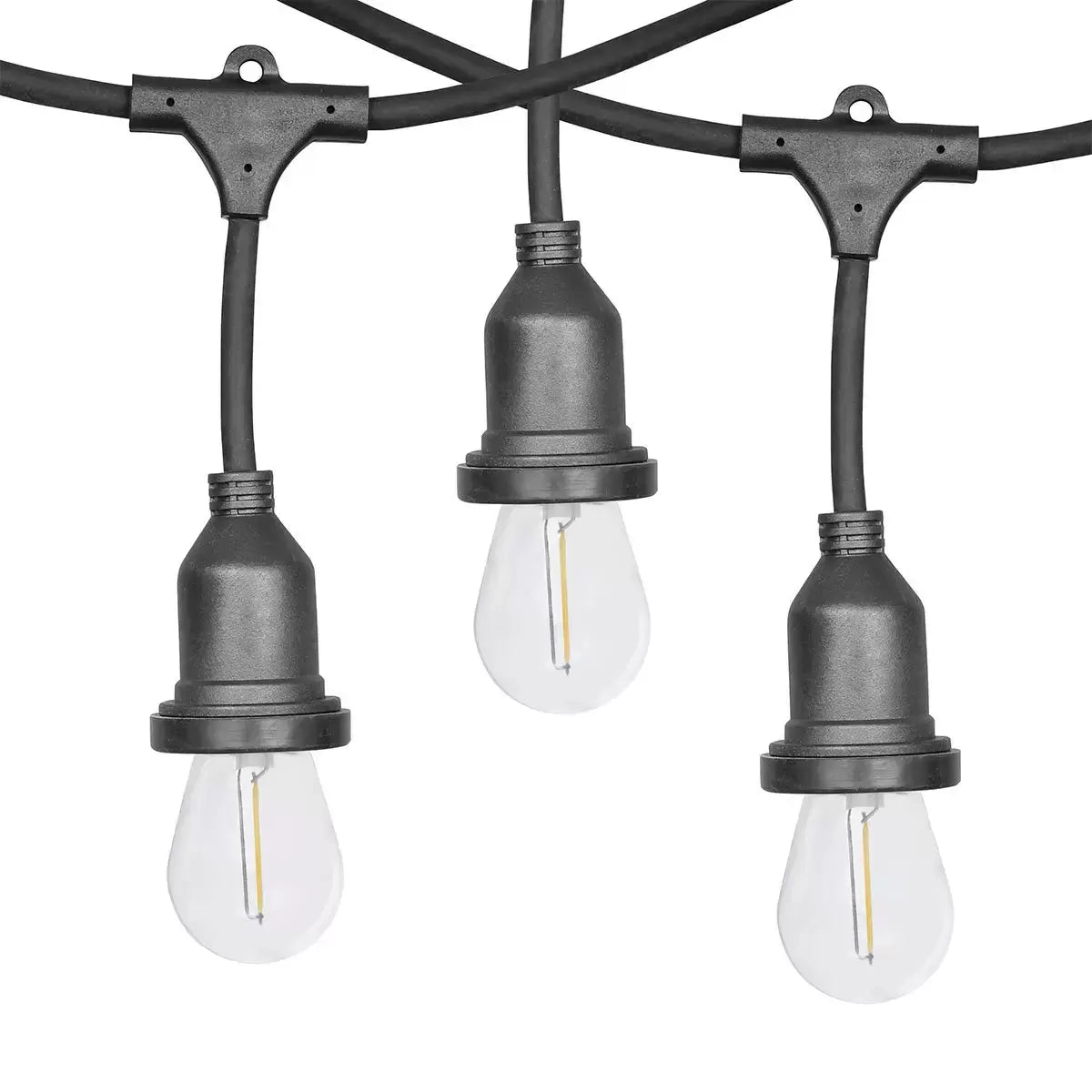A set of heavy-duty Feit S14 replacement LED bulbs displaying their gold-toned vintage style filaments, arranged in a protective 24-pack box on a dark wooden work surface.