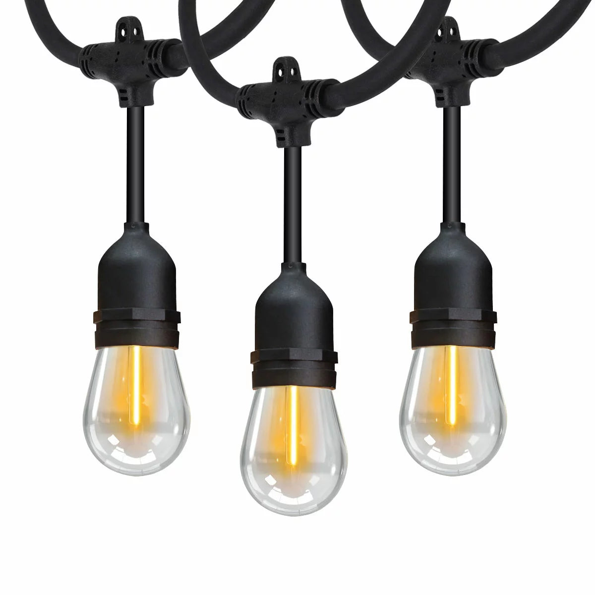 A 48ft strand of Feit LED string lights with warm glowing vintage-style bulbs hanging across a dark backyard patio.