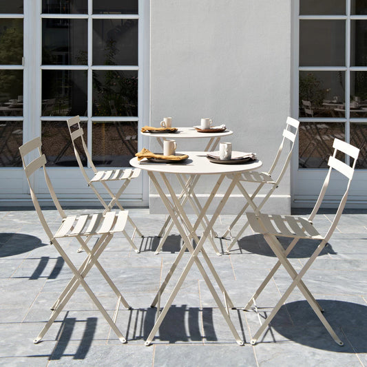 Authentic 3-piece Fermob Bistro set in a sophisticated light brown finish, placed on a modern timber deck.