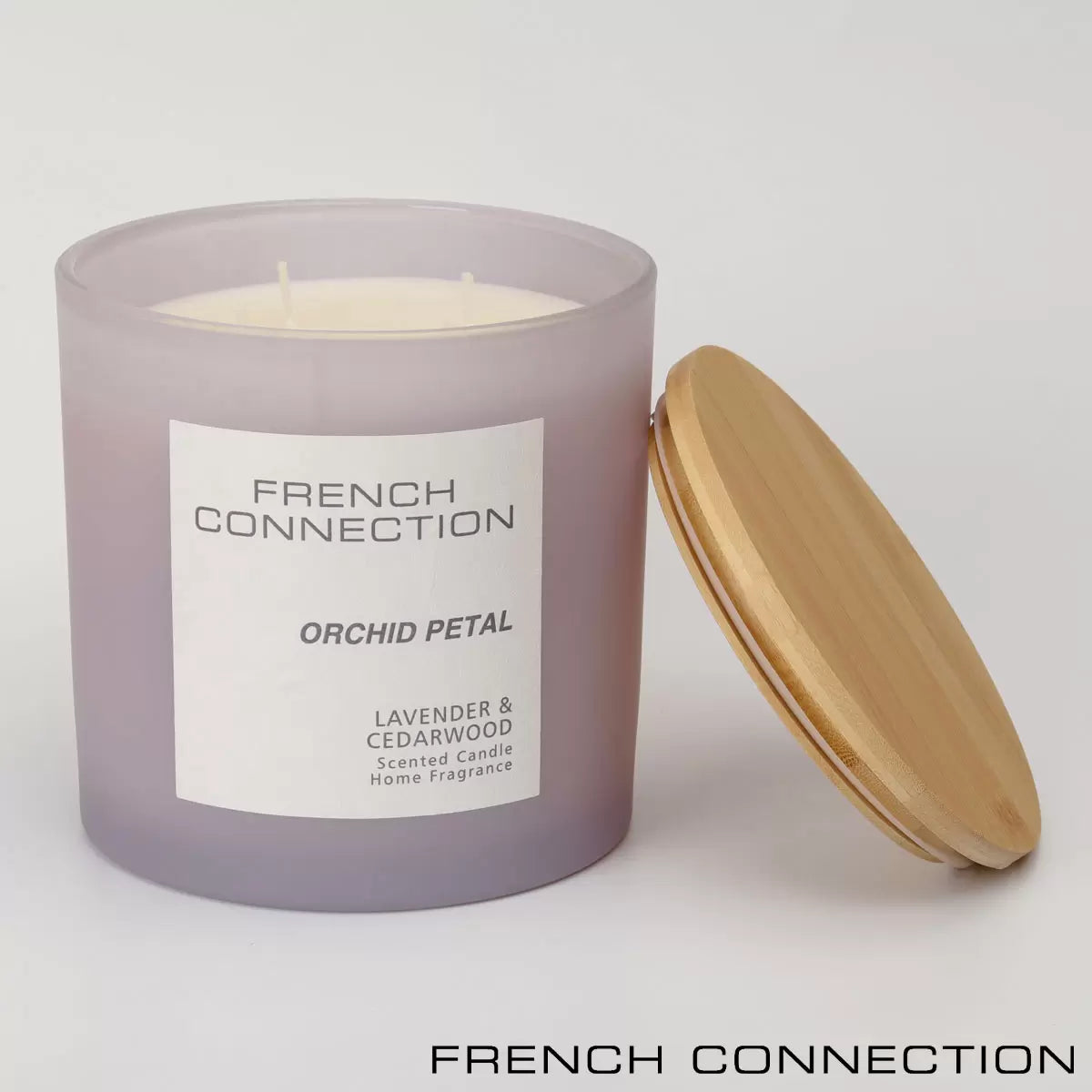 French Connection Pastel XL 4-wick scented candle with bamboo lid on display
