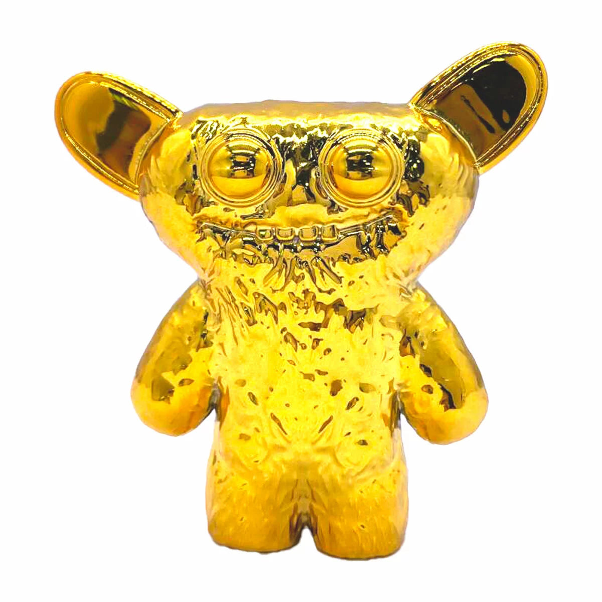 Front view of the Fuggler 24-pack deluxe display box showing 20 colorful mini monster figures with realistic teeth arranged inside clear packaging alongside 4 hidden mystery boxes.