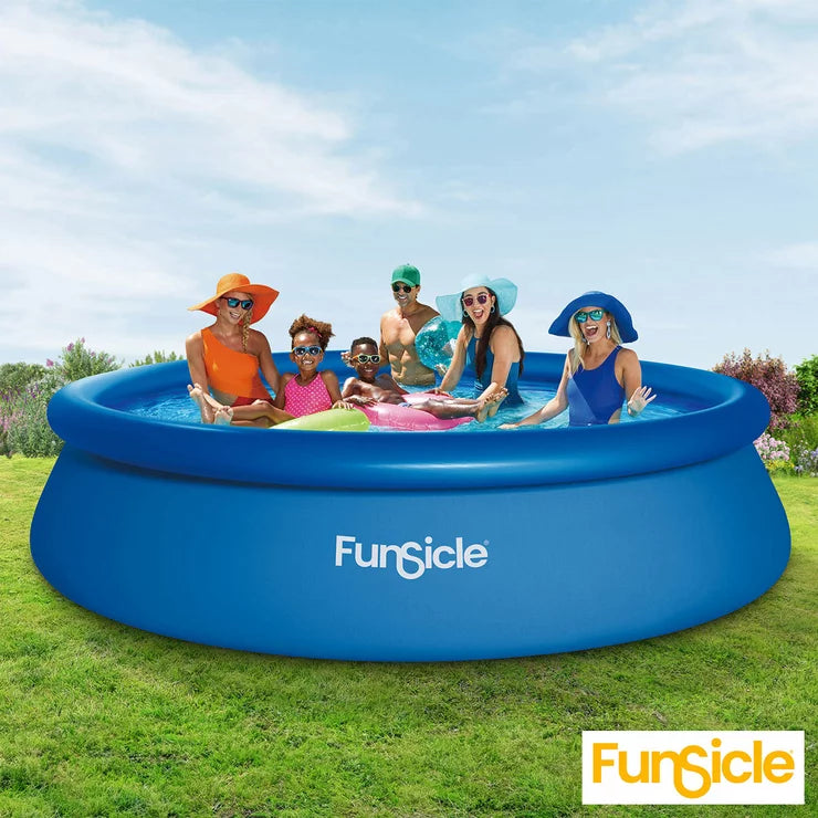 FunSicle 12ft QuickSet inflatable pool with filter pump, blue pool cover, and ground cloth on a green lawn.