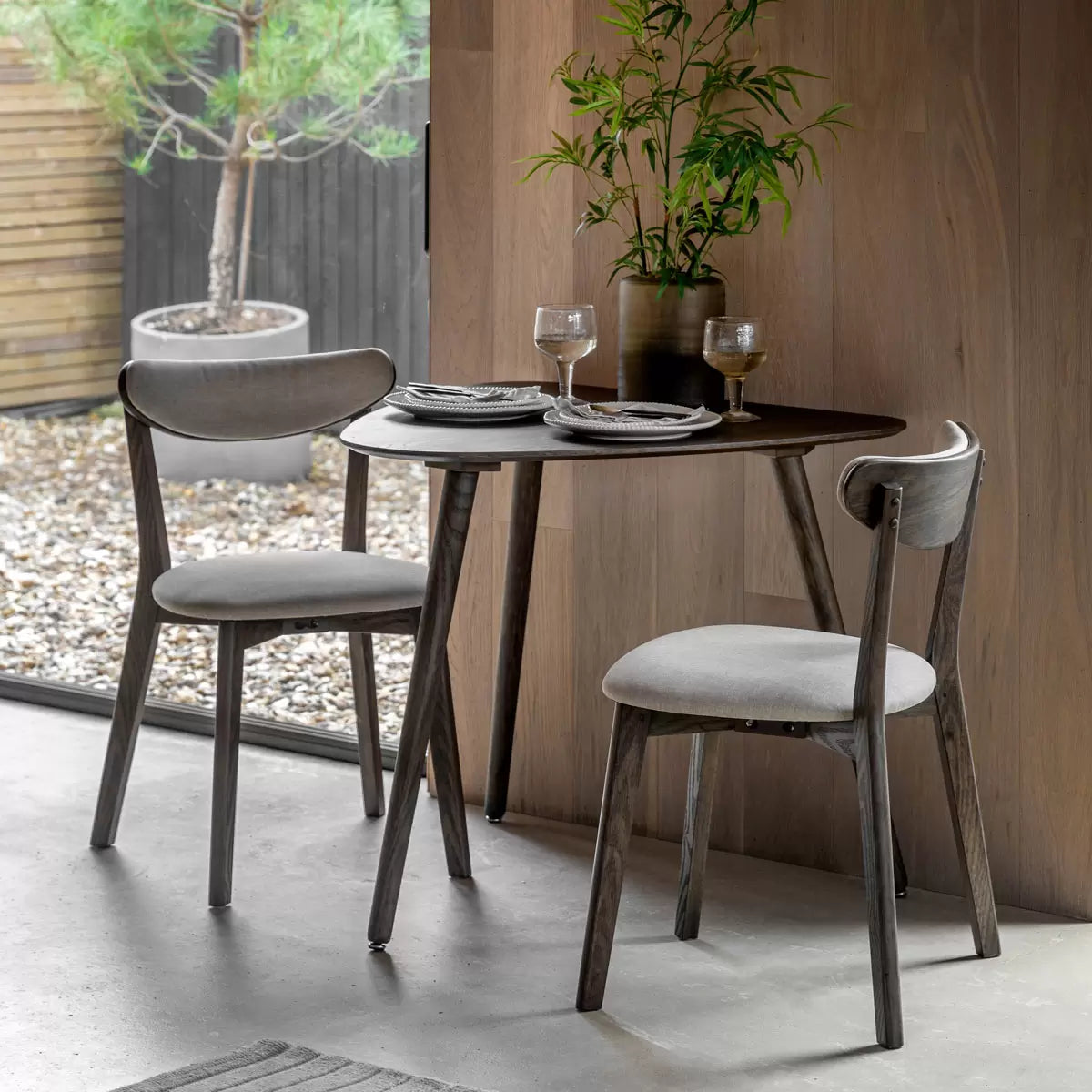 Gallery Hatfield small dining table in smoked and natural wood finish seating two people in a compact dining space - 1