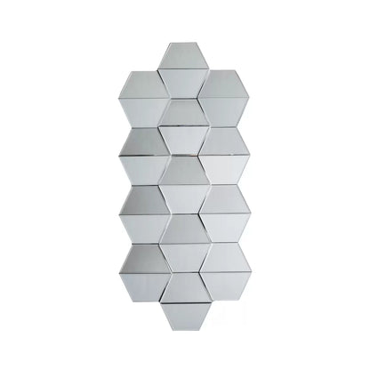 Front view of the 50x110cm Gallery Carina geometric wall mirror showing silver hexagonal honeycomb facets mounted on a neutral wall.