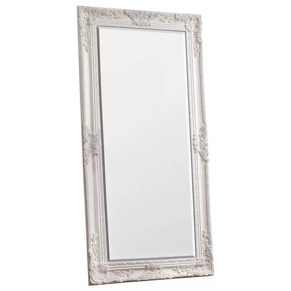 Gallery Hampshire antique matt cream wooden leaner mirror in baroque design leaning against a light living room wall