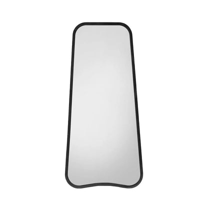 Front view of the Gallery Kurva Black Leaner Mirror measuring 56.5 by 123cm with rounded corners and a matte black metal frame leaning against a neutral living room wall.