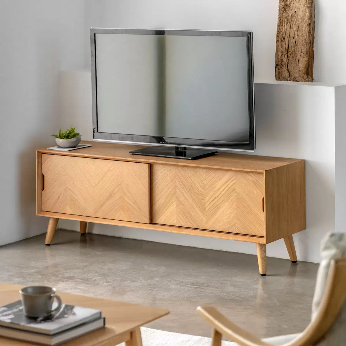 Gallery Milano Oak Entertainment Unit with storage shelves for TVs up to 55 inches in a modern living room