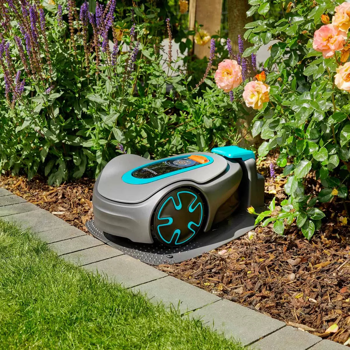 Gardena Sileno Minimo smart robotic lawn mower with charging station maintaining a small residential garden up to 250 square metres
