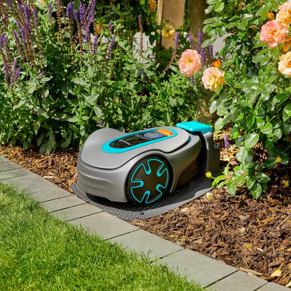 Gardena Sileno Minimo smart robotic lawn mower with charging station maintaining a small residential garden up to 250 square metres
