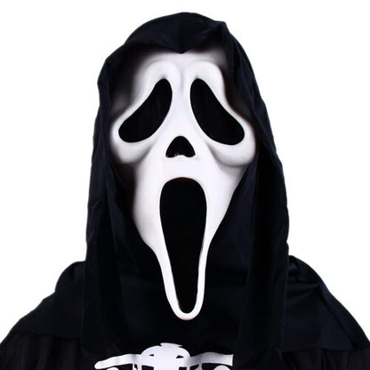 Front view of an adult wearing a classic white Ghost Face horror mask with an integrated black cloth hood in a dark setting