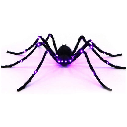Angle view of a 2.9ft giant black hairy spider decoration with glowing red LED eyes crouching on a dark background.