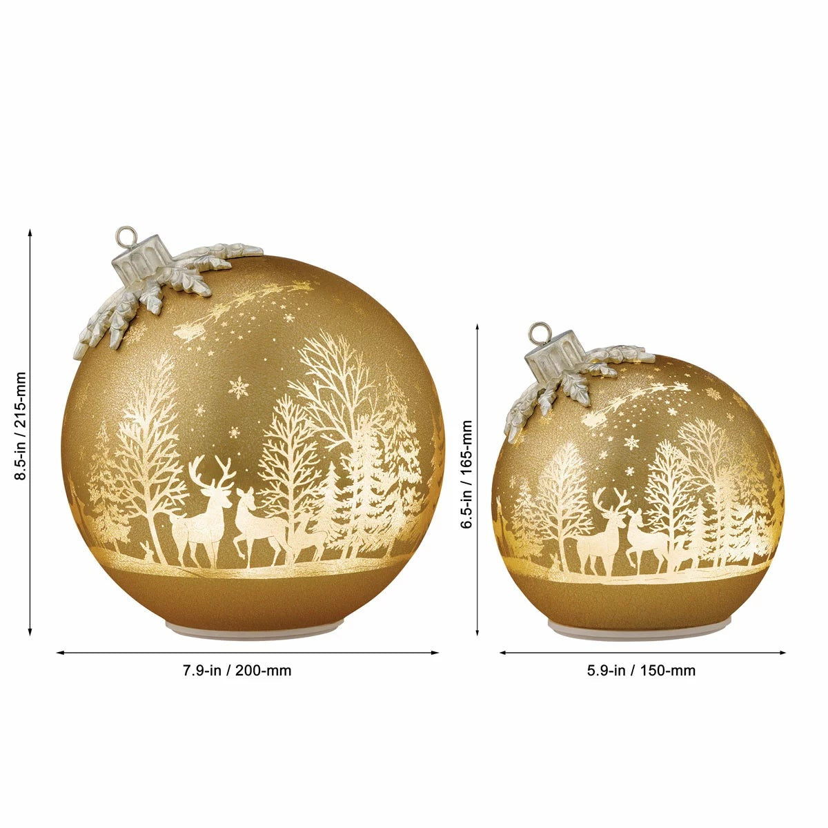 Pair of illuminated frosted glass rotating ball ornaments featuring etched reindeer and winter forest scenes glowing on a modern mantelpiece.