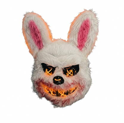 Front angle of a glowing bloody bear and bunny horror Halloween mask made of hard plastic with luminescent trim and red blood splatter details.