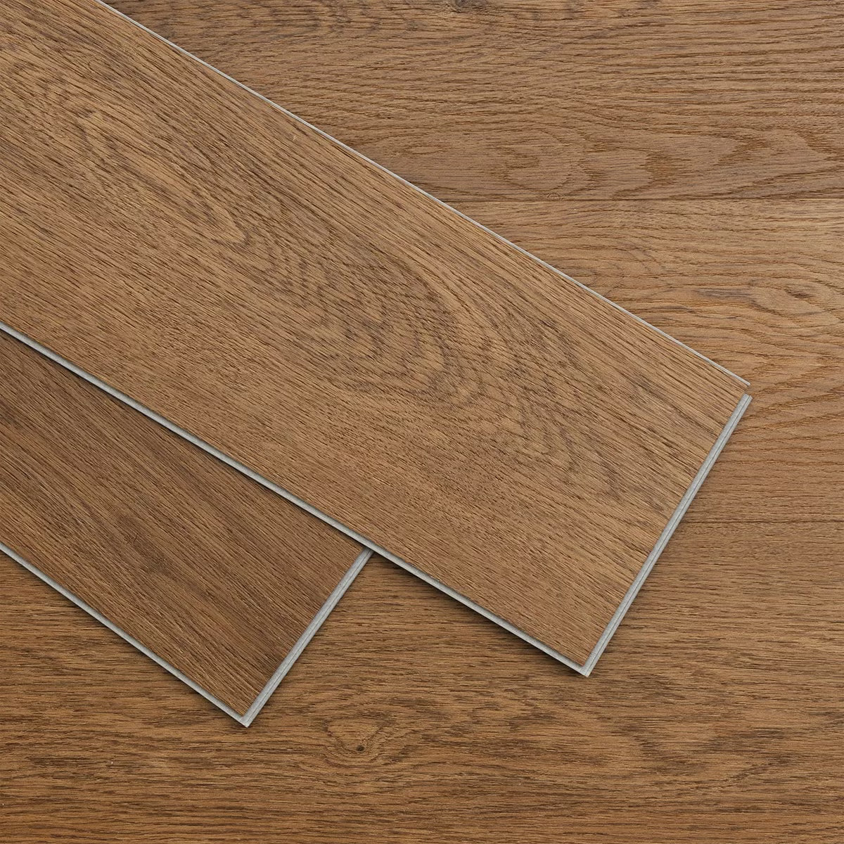 Golden Select Hampstead oak-effect SPC luxury vinyl plank featuring click-lock profile and pre-attached foam underlay displayed in a contemporary kitchen setting.