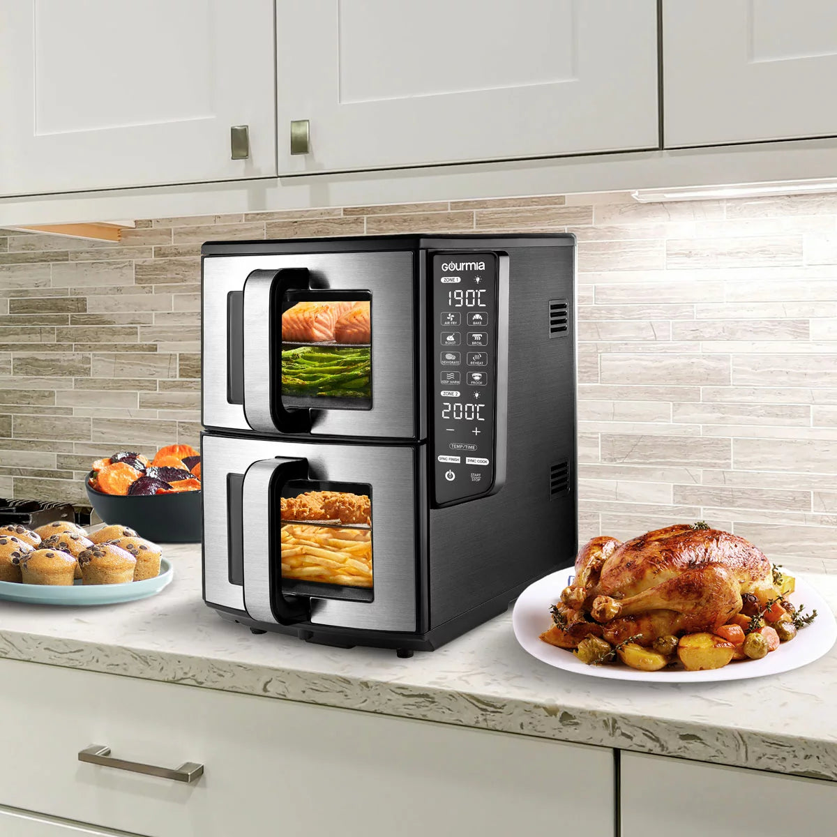 Gourmia Double Decker Air Fryer GAF1180, showcasing the sleek black finish with its vertical stacked baskets and digital LED control panel on a granite kitchen island.