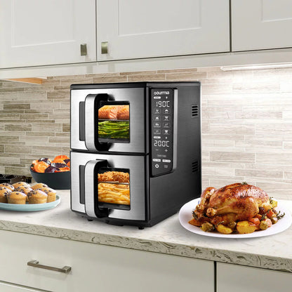Gourmia Double Decker Air Fryer GAF1180, showcasing the sleek black finish with its vertical stacked baskets and digital LED control panel on a granite kitchen island.