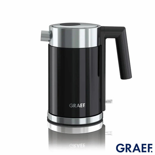 Sleek matte black Graef WK402 1L electric kettle resting on its 360 degree contact base against a modern kitchen backdrop.