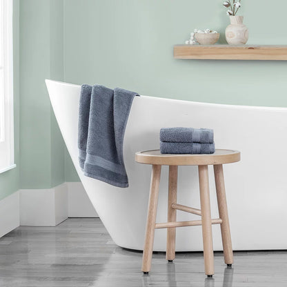 Grandeur 100% Cotton Hand Towels in a 2-pack bundle, demonstrating the thick pile texture and sturdy double-stitched borders.