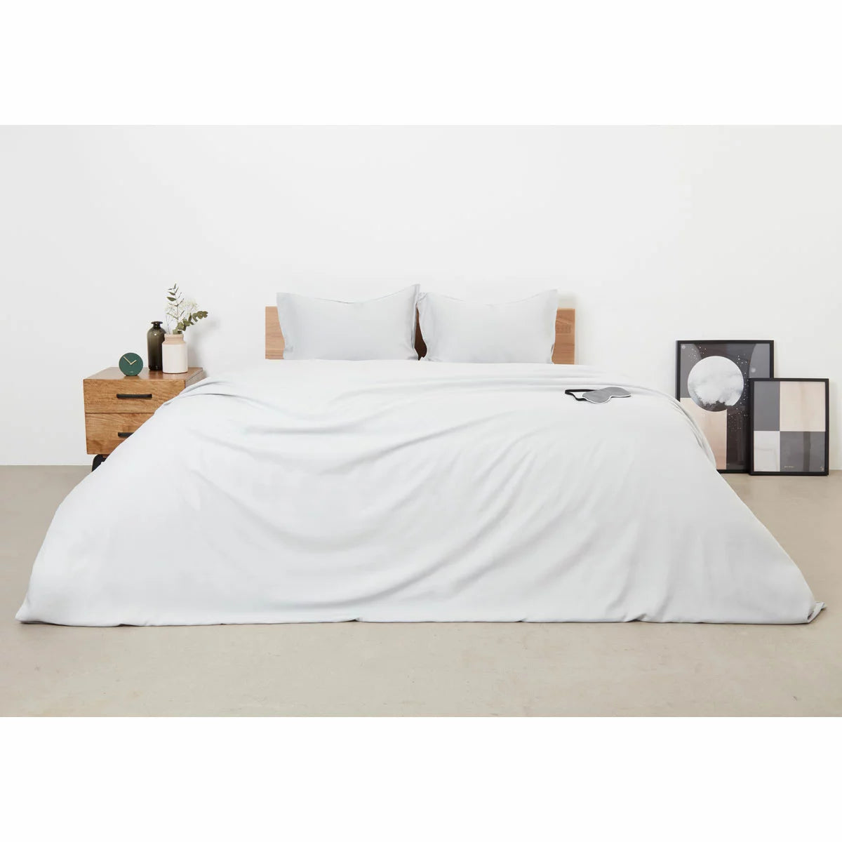 Panda Grey Bamboo and French Linen Duvet Cover Set on a bed featuring crisp matte texture, Oxford pillowcase edges, and raw bamboo buttons.