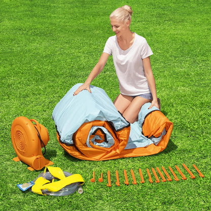 H2OGO! Tidal Tower orange inflatable mega water park with climbing tower, water slide, splash pool, crawl-through tunnel, sprinkler wall, and dump bucket set up in a sunny family garden-3