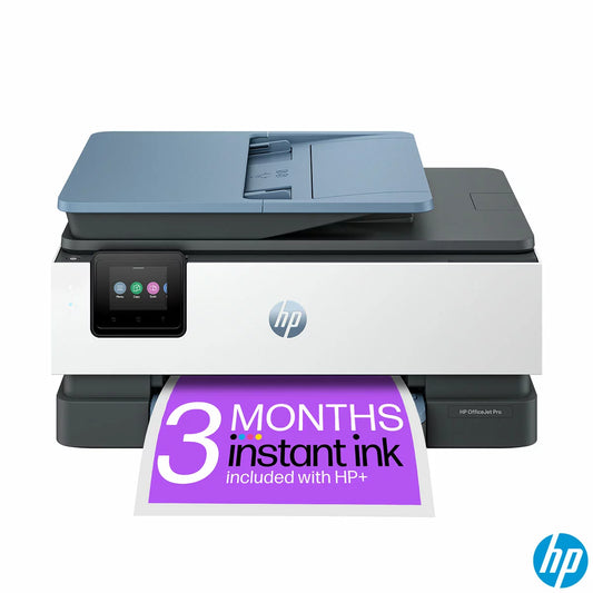 A sleek black and white HP OfficeJet Pro 8125E A4 printer sitting neatly on a minimalist wooden home office desk next to a modern smartphone displaying a print application.