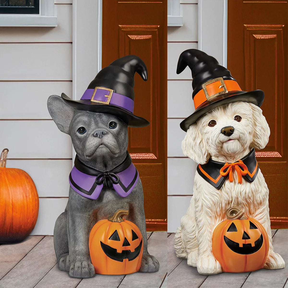 Front view of a 26-inch hand-painted resin Halloween dog greeter figurine dressed in a whimsical seasonal outfit, displayed on a front porch next to autumn pumpkins.