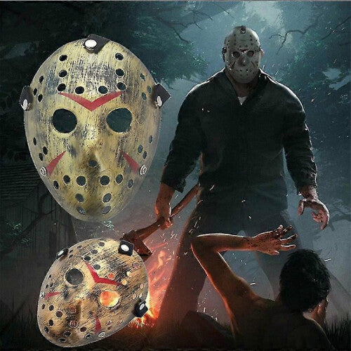 Front view of an iconic white and red painted Jason Voorhees Friday the 13th scary hollow out plastic mask on a dark background.