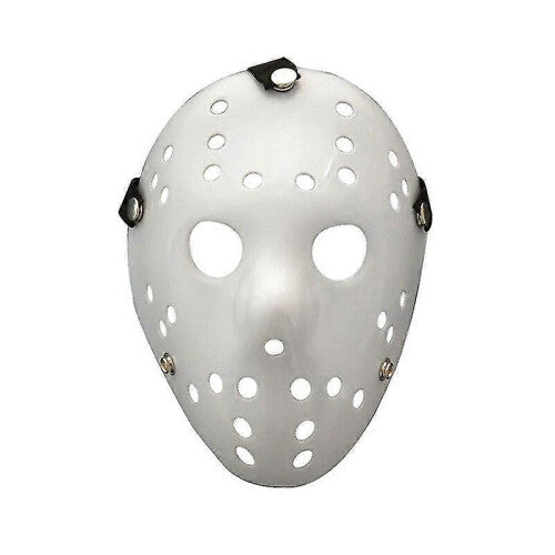 Front view of an iconic white and red painted Jason Voorhees Friday the 13th scary hollow out plastic mask on a dark background.