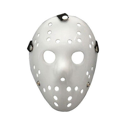 Front view of an iconic white and red painted Jason Voorhees Friday the 13th scary hollow out plastic mask on a dark background.