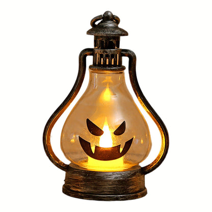 A high-brightness Halloween LED smiley face lantern hanging by its hook and glowing softly on a decorated tabletop.