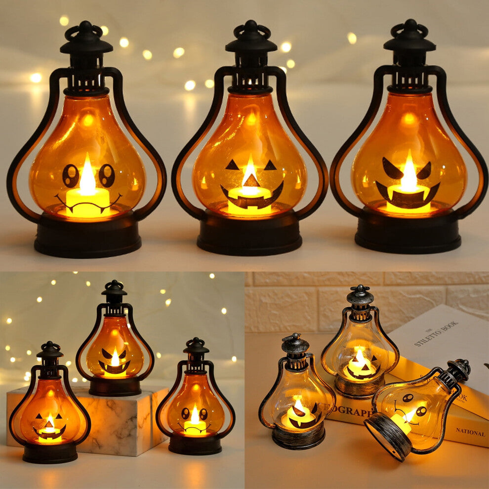 A high-brightness Halloween LED smiley face lantern hanging by its hook and glowing softly on a decorated tabletop.